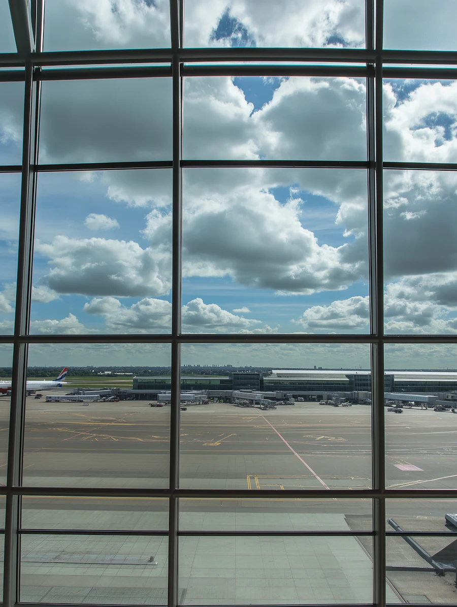 An empty airport runway stretching toward the horizon